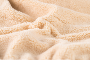 Jas met rits in teddy soft beige